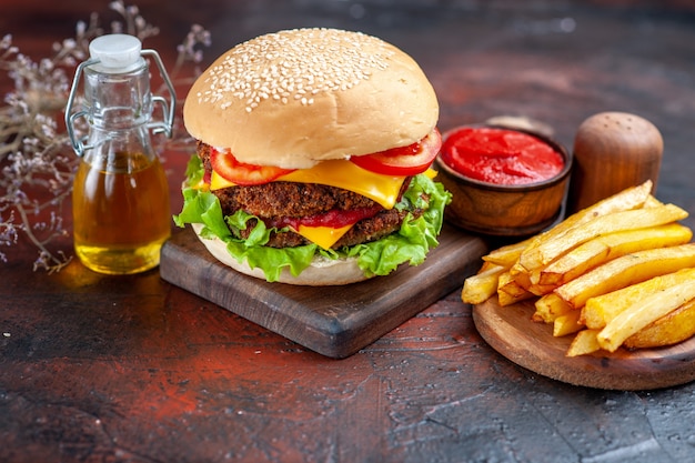 Tasty Meat Burger with French Fries on Dark Background – Free Download