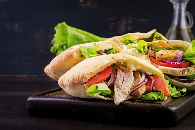 Pita Stuffed with Chicken, Tomato, and Lettuce – Free Stock Photo for Download