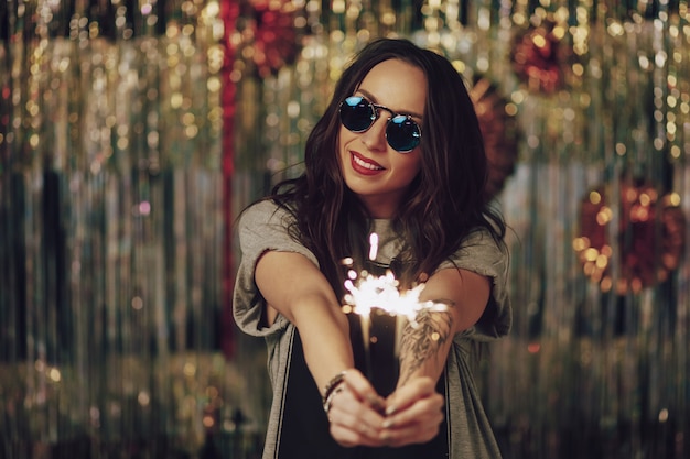 Attractive Hipster Woman Holding Sparklers – Free Download