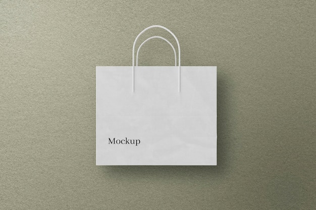 White Paper Bag Mockup on Wall Background – Free Stock Photo for Download