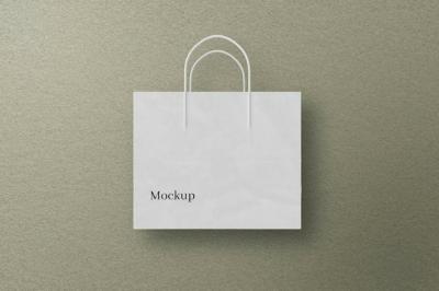 White Paper Bag Mockup on Wall Background – Free Stock Photo for Download