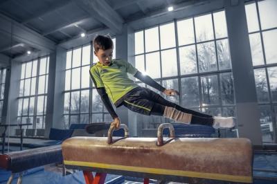 Little Male Gymnast Training in Gym: Flexible and Active – Free Stock Photo, Download for Free