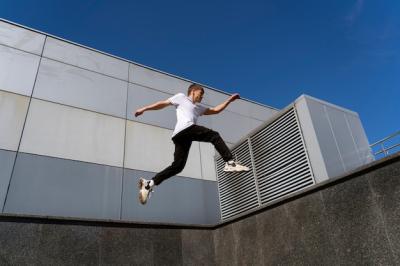 Fit Man Performing Parkour Training – Free Download