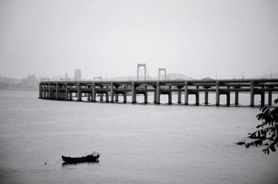 Bridge Over Calm Sea Against Clear Sky – Free to Download