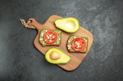 Delicious Sandwiches with Avocado and Red Tomatoes on Grey Background – Free Download