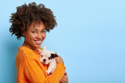 Beautiful African American Woman with Bulldog Puppy at Home – Free Stock Photo, Download for Free