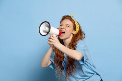 Young Beautiful Redhead Girl Shouting in Megaphone – Free Stock Photo for Download