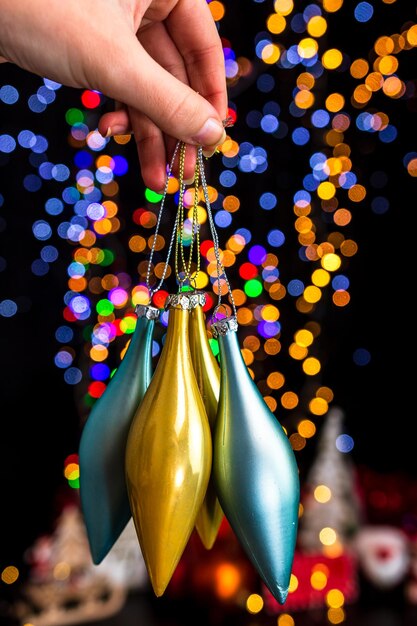 Cropped Hand of Woman Holding Christmas Tree – Free Stock Photo Download