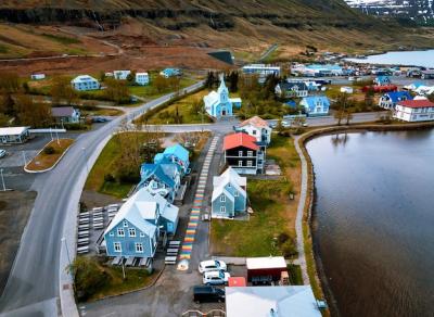 Aerial View of Seydisfjordur Town in Iceland with Rainbow Road and Colorful Buildings – Free Stock Photo for Download