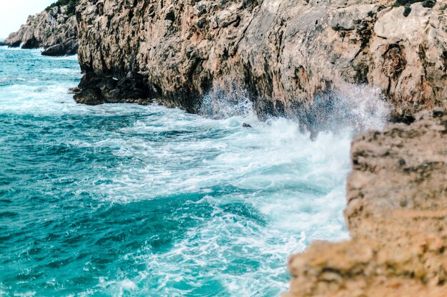 Stunning Sea Waves Crashing on Rocky Seashore – Free Stock Photo for Download