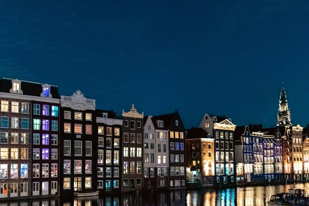 A Row of Buildings with Many Windows Featuring “Amsterdam” – Free Stock Photo for Download