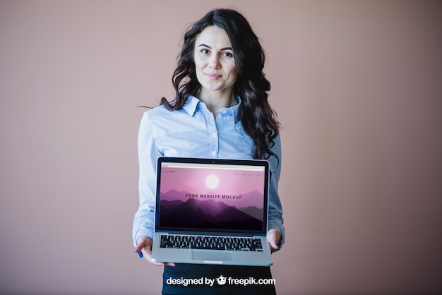 Stylish Businesswoman Presenting Laptop – Free Stock Photo, Download for Free