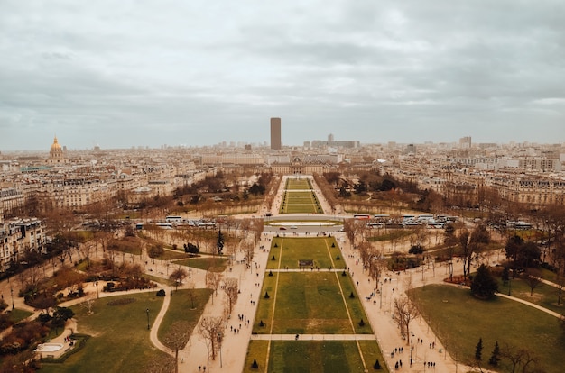 Stunning Aerial View of Eiffel Tower Gardens with Stormy Sky – Free Download