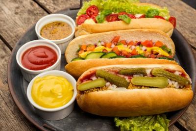 High Angle Arrangement of Hot Dogs and Sauces – Free Download