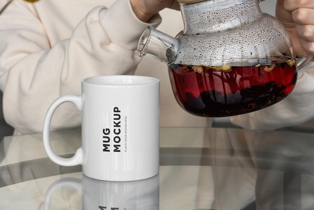 A Stunning Mug Mockup on the Table with Teapot – Free to Download