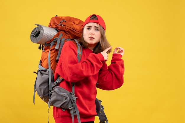 Confused Female Traveler Pointing with Backpack – Free Stock Photo, Download Free