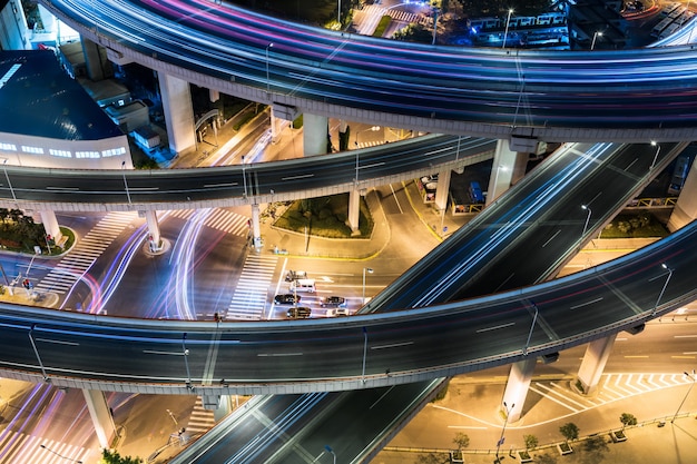 Stunning Night Scene of Shanghai: Car Trails over Nanpu Bridge – Free Download