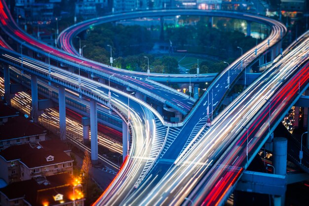 Stunning Nighttime Light Trails on City Bridge – Free to Download