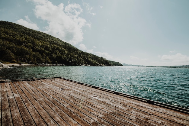 Beautiful Landscape of a Lake with a Pier – Free to Download