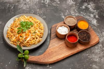 Side Close-Up View of Cabbage in Bowl with Spices and Citrus Fruit – Free Download