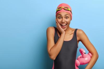 Happy Woman in Swimming Costume and Rubber Swimcap – Free Download