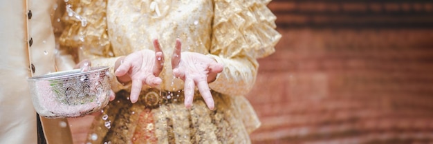 Close-Up of Young Couple in Traditional Thai Costumes Celebrating Songkran Festival