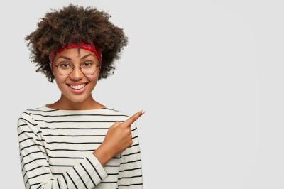 Happy Delighted Freelancer with Afro Hairstyle – Free Download