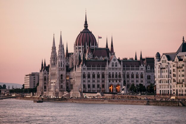 Reflection of Building by River with City in Background – Free Stock Photo, Download Free