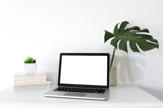 Laptop on Office Desk with Blank White Screen – Free Download