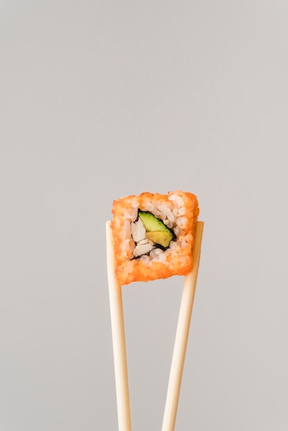 Chopsticks and Sushi Roll – Free Stock Photo, Download for Free