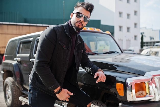 Fashionable Arab Man with Rich Beard in Black Jeans Jacket and Sunglasses – Free Stock Photo, Download Free