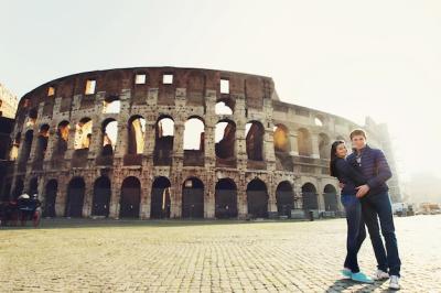 Two People Near the Coliseum in Rome – Download Free Stock Photo