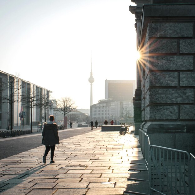 Man Walking on City Street – Free Download