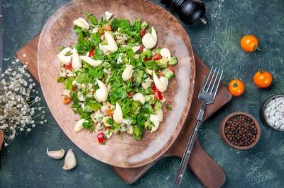 Delicious Vegetable Salad on Dark Blue Plate – Free Download