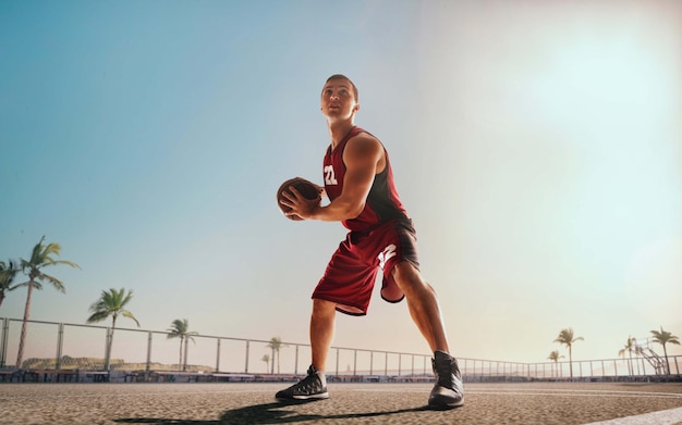 Action Shot of Basketball Player at Sunset – Free Download