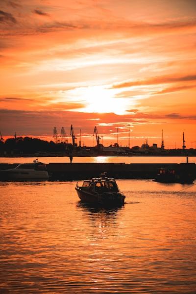 Ship on the Sea at Sunset Reflection – Free Download