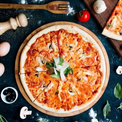 Delicious Pizza Topped with Tomato and Mushrooms – Free Download