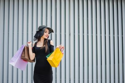 Girl in Black Dress Carrying Shopping Bags – Free to Download