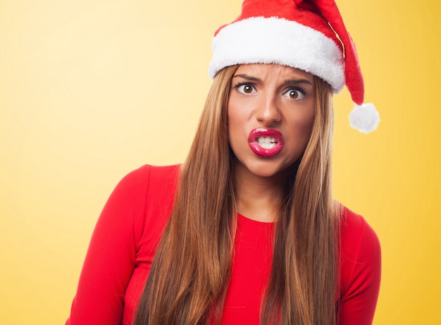 Angry Woman with Sand on Yellow Background – Free Download