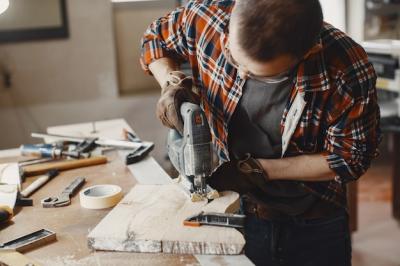 Craftsman Using Circular Saw – Free Stock Photos for Download