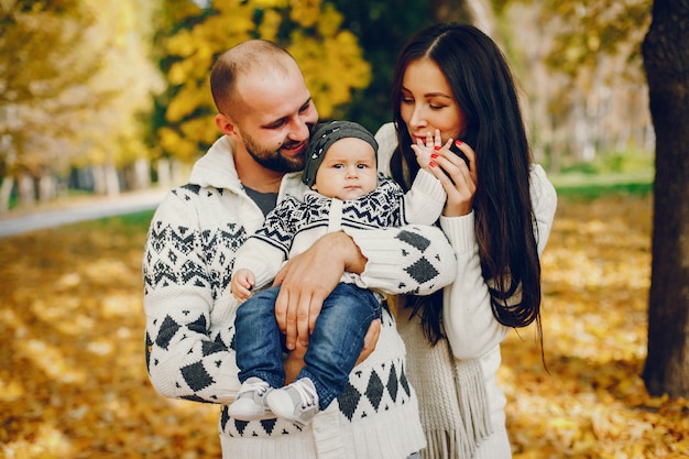 Family Enjoying a Day in an Autumn Park – Free Download