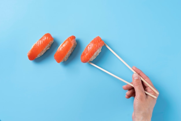 Close-Up Hand Holding Chopsticks – Free Stock Photo, Download for Free