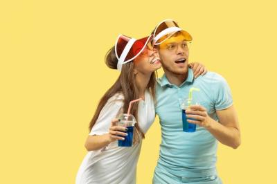 Beautiful Couple on Yellow Studio Background – Free Download