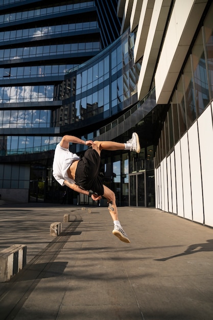 Man Jumping Outdoors – Free Stock Photo for Download