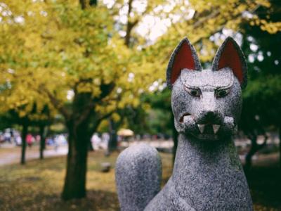 Close-up of Stone Statue Surrounded by Autumn Trees in Park – Free Download