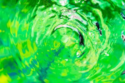 Close-Up Water Rings on a Green Pool Surface – Free Download