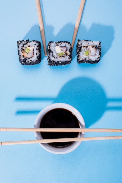 Three Sushi Rolls on Table – Free Download