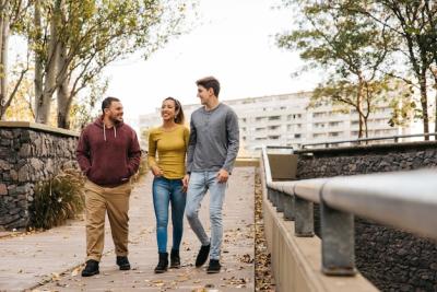 Multiethnic Friends Enjoying an Autumn Walk – Free Download