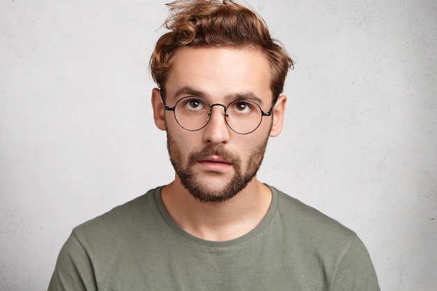 Trendy Indoor Portrait of a Bearded Young Man – Free Download