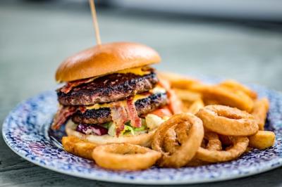 Appetizing Burger Closeup with Onion Rings – Free Download